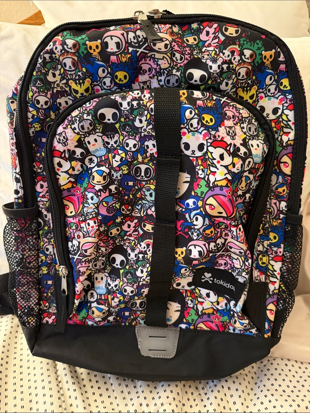 Tokidoki All Stars Basic Sports Backpack.  Features vibrant characters.